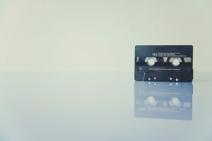 black cassette tape on white surface